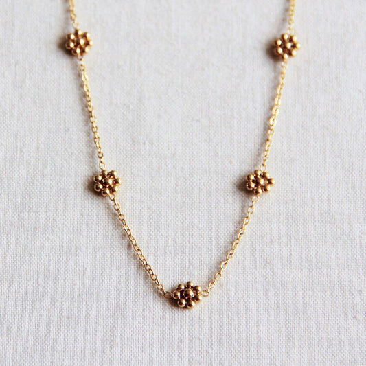 COLLAR  DORADO MICROFLORES LIRA