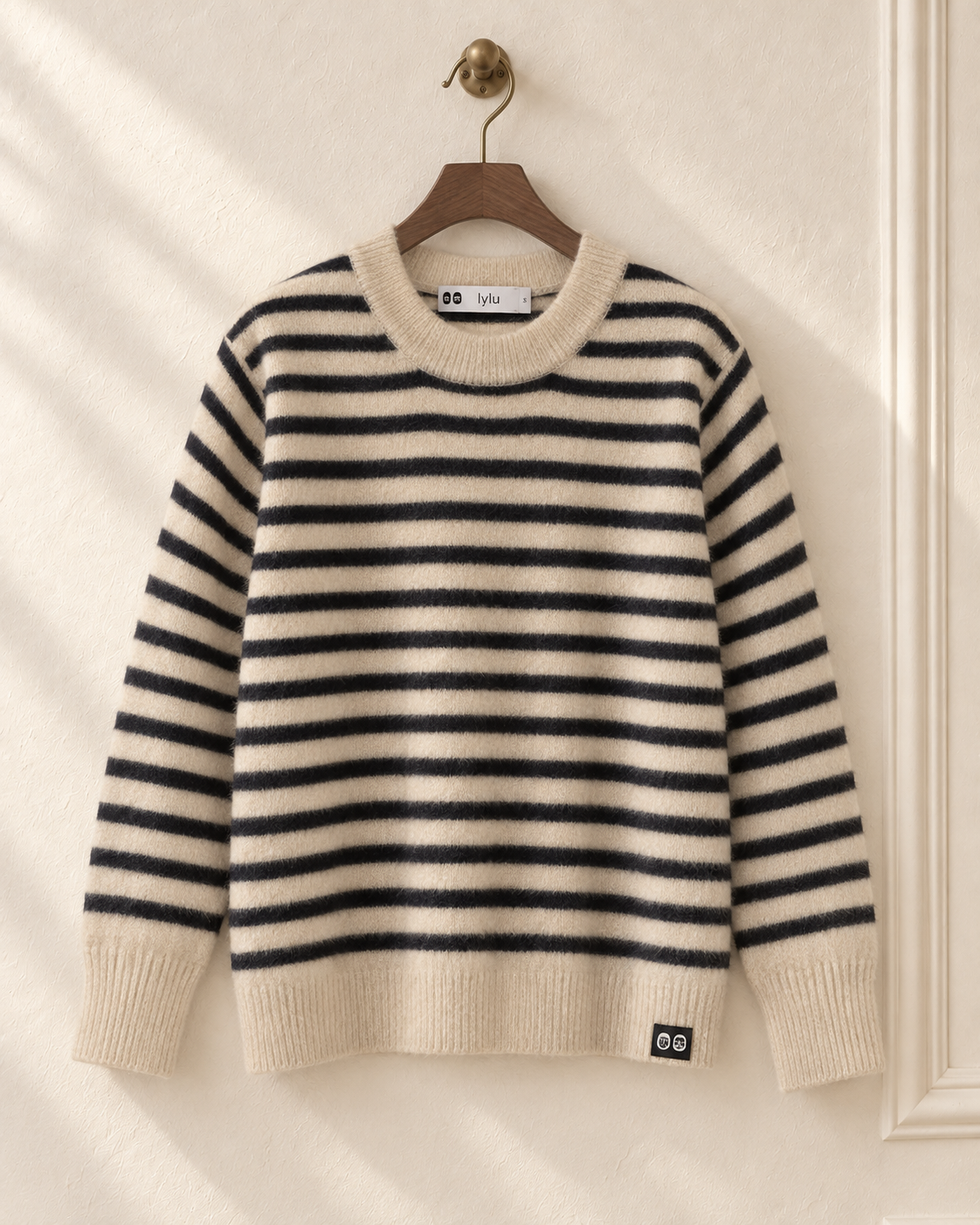 Jersey de rayas beige y negro Astorga en percha – LYLU