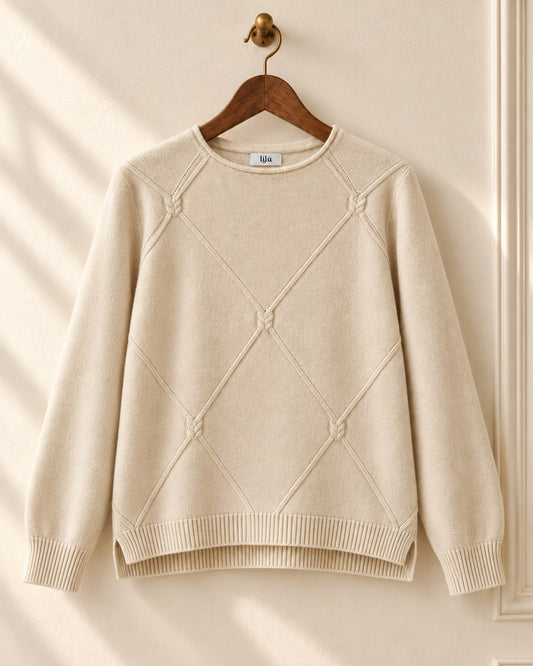 Jersey Cangas de LYLU beige de punto fino con rombos calados sobre percha