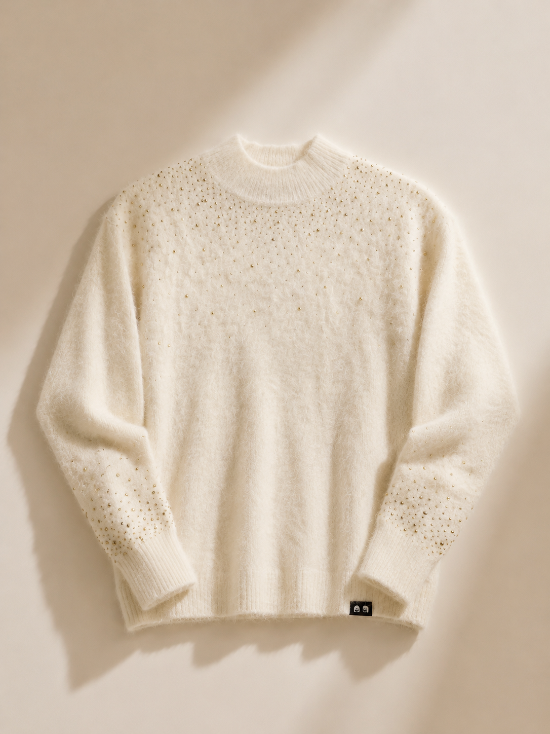 Jersey Getxo de LYLU en blanco roto con brillos, manga larga y tacto afelpado